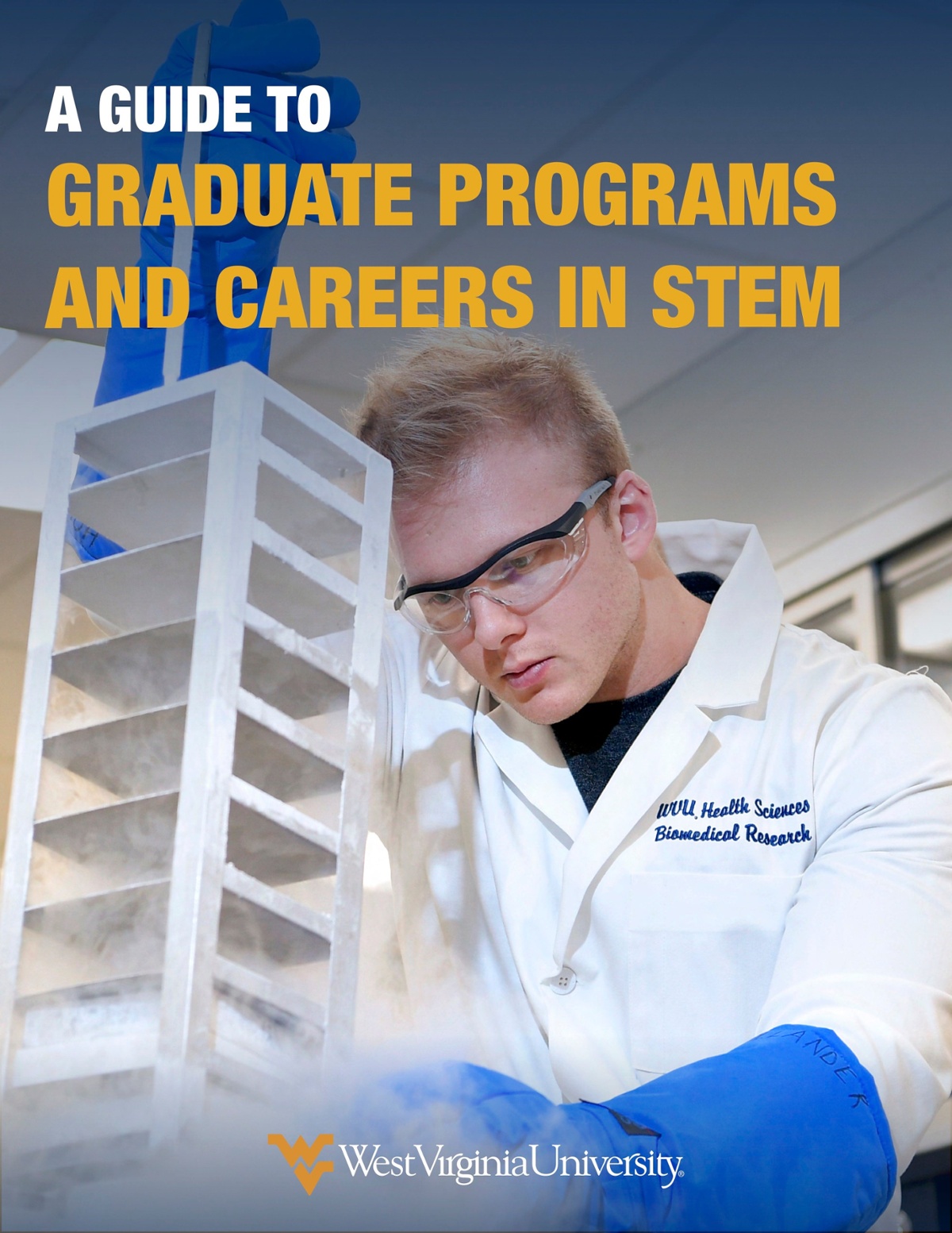 An e-book cover titled, “A Guide to Graduate Programs and Careers in STEM” and a male graduate student in a research lab.