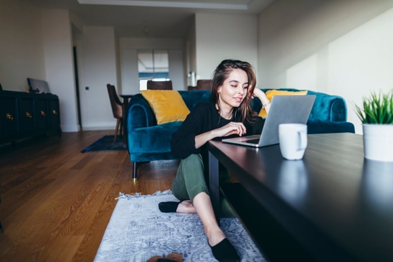 young woman studying using a laptop